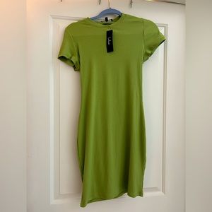 Green knit midi length dress with open back